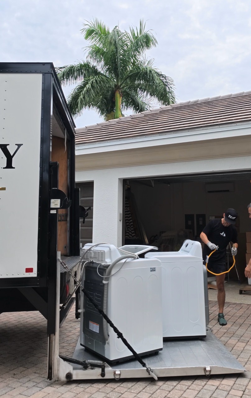 Fox and Dolly crew safely loading household appliances